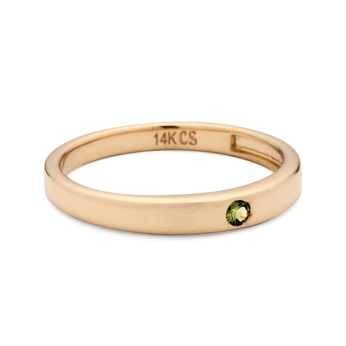 A simple, elegant gold signet ring with a solitary, bezel-set Australian sapphire, showcased against a white backdrop.
