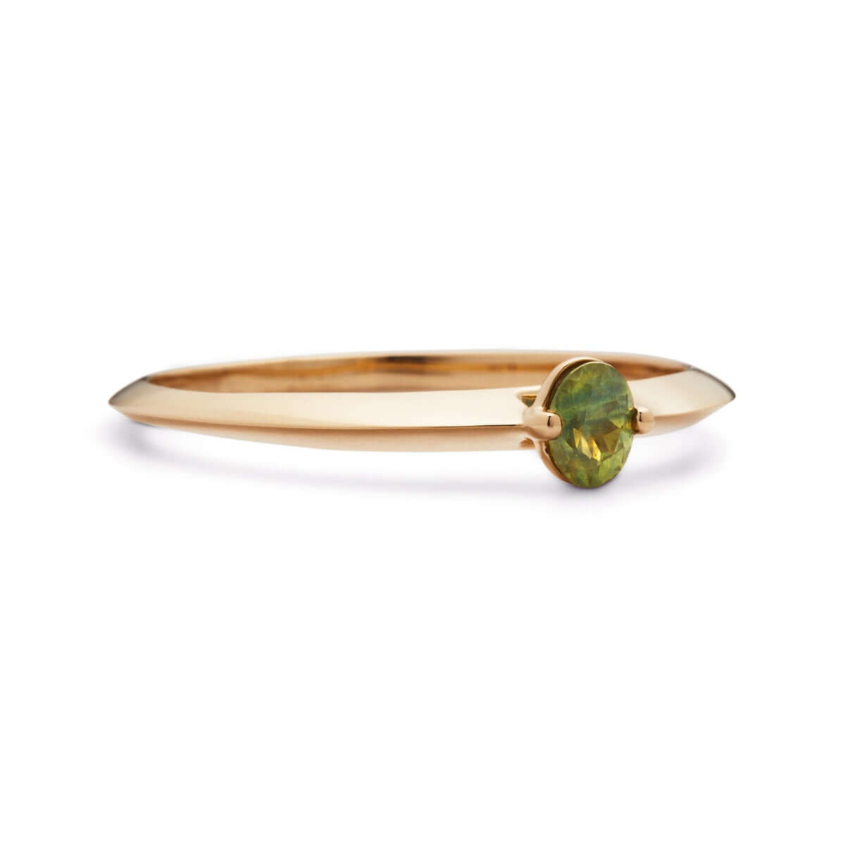 Side angle of a small oval Australian sapphire set in a thin gold band.