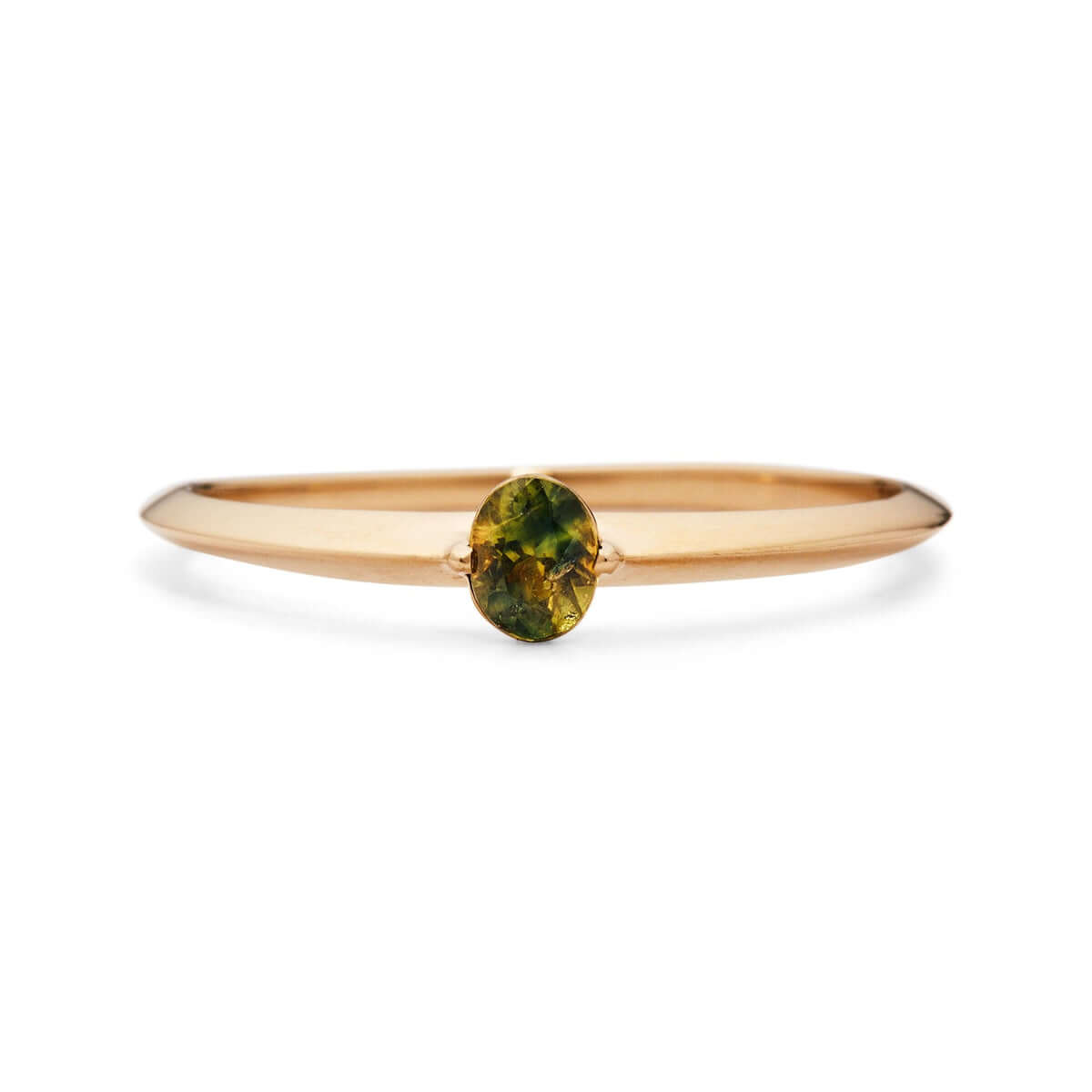 side view of the 'Floe' ring with the gold band leading to an oval Australian sapphire.