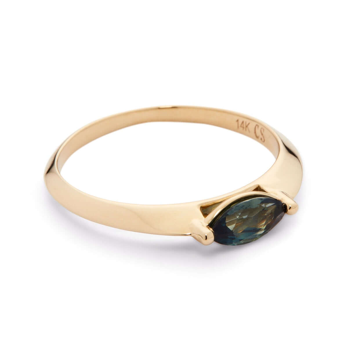 A side view of a yellow gold ring with a marquise-cut Australian sapphire on white.